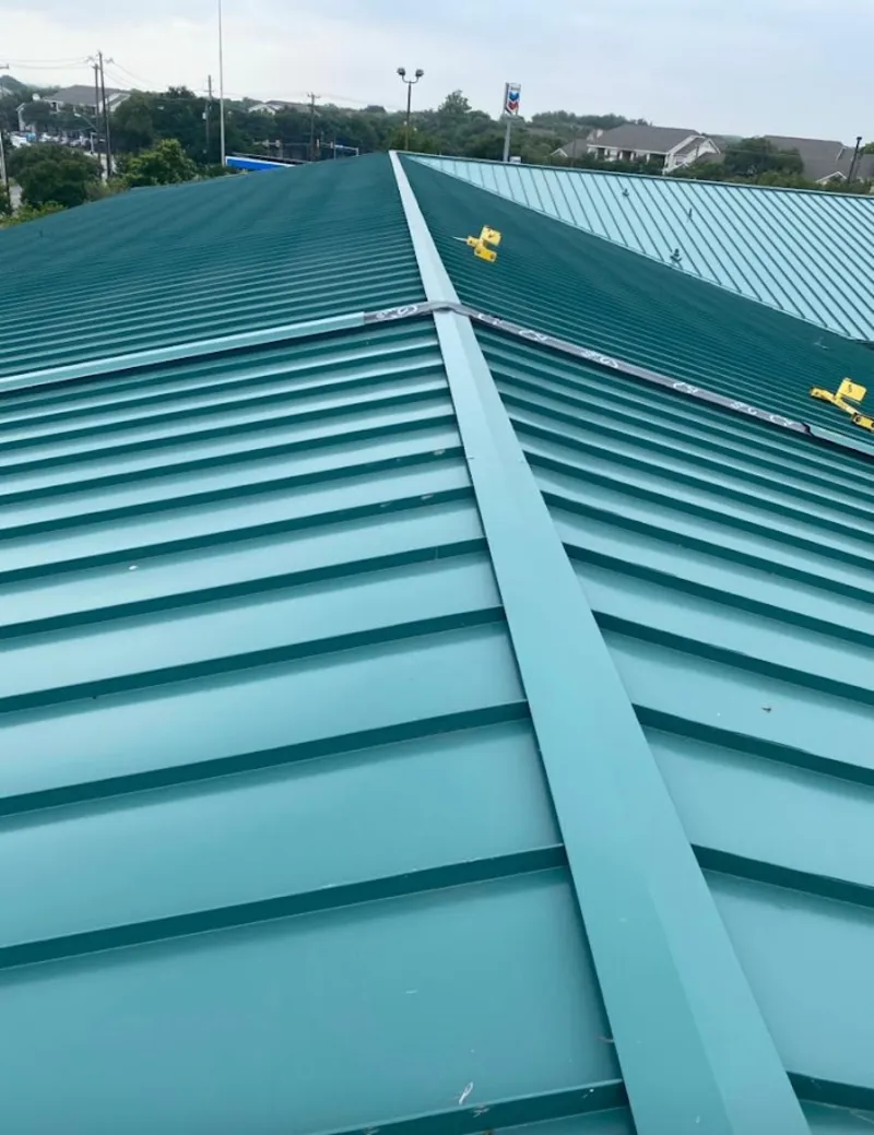 Green commercial metal roof ridge and valley for Metal Roof Repair in Irving